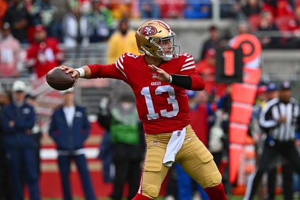 San Francisco 49ers quarterback Brock Purdy (13) throws a pass in the second quarter of their NFC wild-card playoff game at Levi's Stadium in Santa Clara, Calif., on Saturday, Jan. 14, 2023. (Jose Carlos Fajardo/Bay Area News Group)