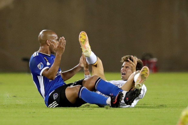 STANFORD, CALIFORNIA - SEPTEMBER 24: LA Galaxy's Ricard Puig (6) and San Jose Earthquakes' Judson (93) argue after Puig was fouled in the first half of their MLS California Clasico at Stanford Stadium in Stanford, Calif., on Saturday, Sept. 24, 2022. (Ray Chavez/Bay Area News Group)