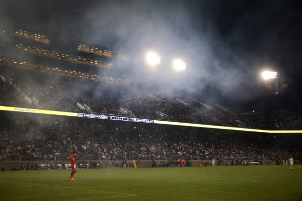 STANFORD, CALIFORNIA - SEPTEMBER 24: The Stanford Stadium is covered by smoke after fans from both sides lit up smoke bombs during the MLS California Clasico between the LA Galaxy and the San Jose Earthquakes in the second half in Stanford, Calif., on Saturday, Sept. 24, 2022. (Ray Chavez/Bay Area News Group)