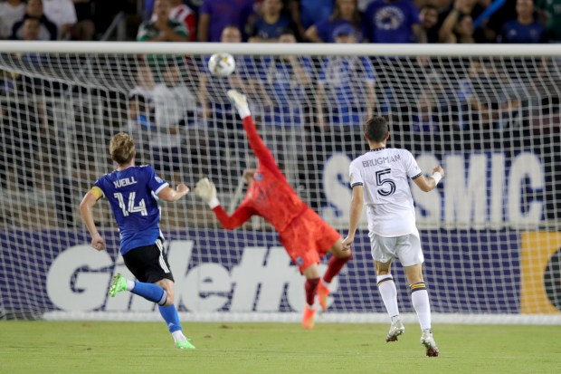 STANFORD, CALIFORNIA - SEPTEMBER 24: San Jose Earthquakes goalkeeper JT Marcinkowski (1) can't make a save on a goal scored by LA Galaxy's Gaston Brugman (5) in the first half of their MLS California Clasico at Stanford Stadium in Stanford, Calif., on Saturday, Sept. 24, 2022. (Ray Chavez/Bay Area News Group)