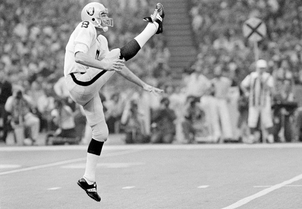 FILE - Oakland Raiders punter Ray Guy kicks during the Super Bowl at the Superdome in New Orleans, Jan. 25, 1981. Ray Guy, the first punter to make the Pro Football Hall of Fame, died Thursday, Nov. 3, 2022, following a lengthy illness. He had been receiving care in a Hattiesburg, Miss. area hospice. He was 72. (AP Photo/Richard Drew, File)