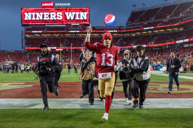 San Francisco 49ers quarterback Brock Purdy (13) leaves the field after leading a 41-23 victory over the Seattle Seahawks in the NFC wild-card playoff game, Saturday, Jan. 14, 2023, at Levi's Stadium in Santa Clara, Calif. (Karl Mondon/Bay Area News Group)