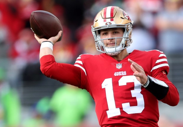 San Francisco 49ers quarterback Brock Purdy (13) passes against the Seattle Seahawks during the NFC wild-card playoff game, Saturday, Jan. 14, 2023, at Levi's Stadium in Santa Clara, Calif. (Karl Mondon/Bay Area News Group)