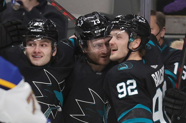 San Jose Sharks center Thomas Bordeleau (23), center Noah Gregor (73) and left wing Rudolfs Balcers (92) celebrate Gregor's goal during the first period of the team's NHL hockey game against the St. Louis Blues in San Jose, Calif., Thursday, April 21, 2022. (AP Photo/Josie Lepe)