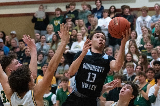 Ryan Beasley of the visiting Dougherty Valley Wildcats looks for the basket in the middle of traffic at San Ramon Valley High School in San Ramon, CA on Tuesday, January 10, 2023. Dougherty Valley takes the win over San Ramon 64-58. (Don Feria for Bay Area News Group)
