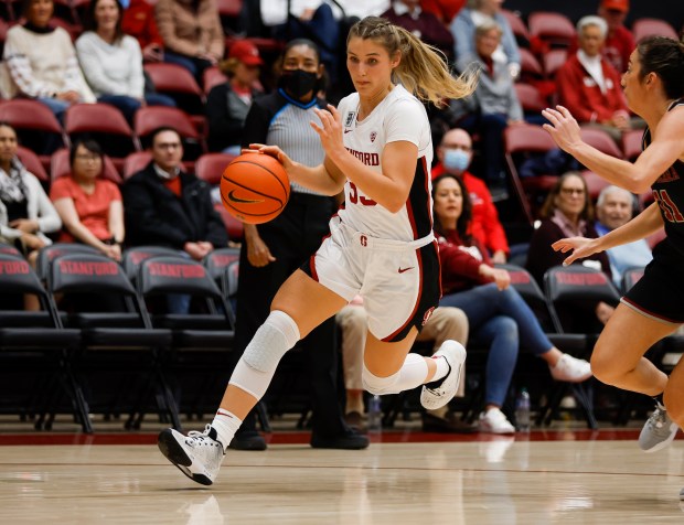 Stanford Cardinal's Hannah Jump (33) dribbles against the Santa Clara Broncos in the first quarter at Maples Pavilion in Stanford, Calif., on Wednesday, Nov. 30, 2022. (Nhat V. Meyer/Bay Area News Group)