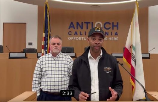 Antioch Mayor Lamar Thorpe, with interim director of public works Scott Bunting to his left, speaks in a livestream Facebook press conferece about the city's preparations for the Level 5 storm anticipated to hit the Bay Area on Wednesday, Jan. 4, 2023.