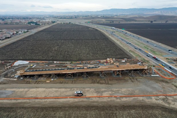 A new pedestrian bridge is constructed across the Highway 4 bypass in Brentwood, Calif., on Thursday, Dec. 8, 2022. The bridge will reconnect the Mokelumne Trail for cyclists and pedestrians, eventually making continuous trail travel possible through six counties. (Jane Tyska/Bay Area News Group)