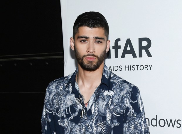 FILE - In this June 9, 2016 file photo, singer Zayn Malik attends the amfAR Inspiration Gala honoring Naomi Campbell and Kim Jones in New York. Malik will debut his Zayn X Versus capsule collection for men and women in May. He'll also appear in the Versus label's next two ad campaigns, starting in February. (Photo by Evan Agostini/Invision/AP, File)