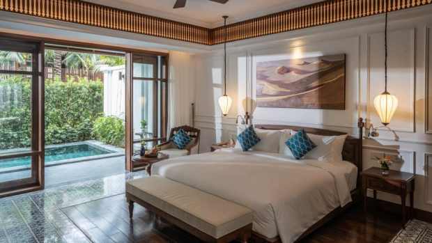 Hand-laid mosaic tiles and cornice detailing, statues on plinths, clawfoot bathtubs and leather-bound tables feature into this new property's elegant design.(Anam Mui Ne via CNN)