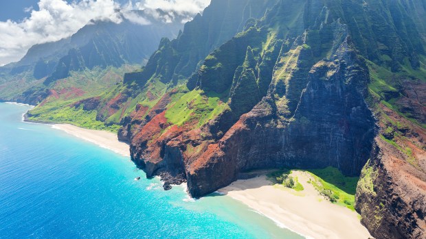 National parks are the best idea we ever had," declared American writer and environmentalist Wallace Stegner. And like many great inventions, the park system became wildly popular. View on Na Pali Coast on Kauai island on Hawaii on a sunny day.(SergiyN/Adobe Stock via CNN)