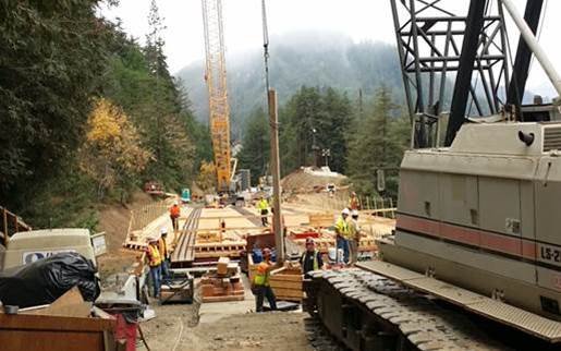 Caltrans workers remove falsework from the new bridge over Pfeiffer Canyonin Big Sur in early September 2017. (Courtesy of Caltrans)