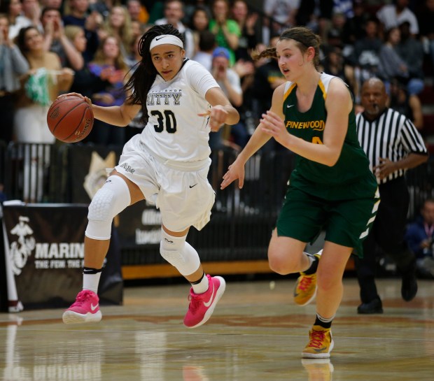 Archbishop Mitty's Haley Jones (30) dribbles past Pinewood's Hannah Jump (24) in the fourth quarter during the Central Coast Section Open Division girls basketball championship game at Santa Clara University's Leavey Event Center Friday, March 3, 2017, in Santa Clara, Calif. (Jim Gensheimer/Bay Area News Group)