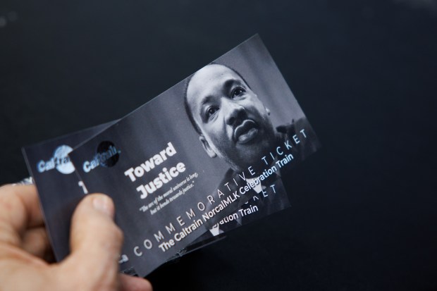 Commemorative tickets of the Caltrain NorcalMLK Celebration Train are given to passengers during Dr. Martin Luther King Jr. Day on Jan. 16, 2023, San Jose, Calif.(Dai Sugano/Bay Area News Group)