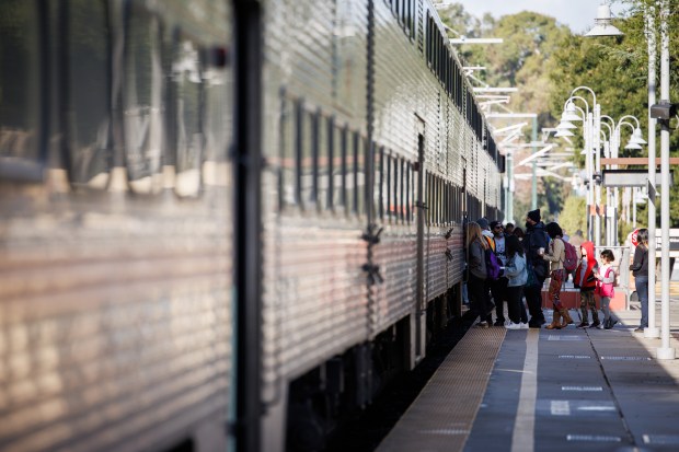 Passengers board the Caltrain NorcalMLK Celebration Train in Palo Alto during Dr. Martin Luther King Jr. Day on Jan. 16, 2023. (Dai Sugano/Bay Area News Group)