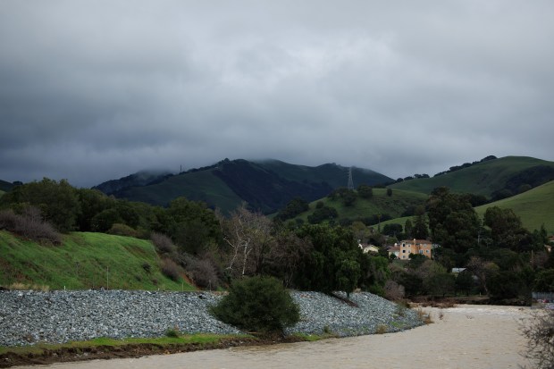 Storm clouds loom over Niles Canyon and the Alameda Creek on Jan. 13, 2023, in Fremont, Calif. (Dai Sugano/Bay Area News Group)