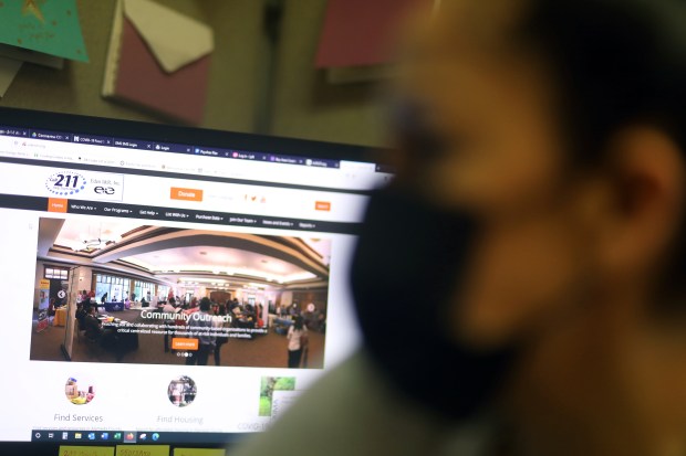 A worker in the Alameda County 211 call center in Hayward, Calif., on Wednesday, June 2, 2021. The 211 call center helps community members with housing information as well as health and human services. (Aric Crabb/Bay Area News Group)
