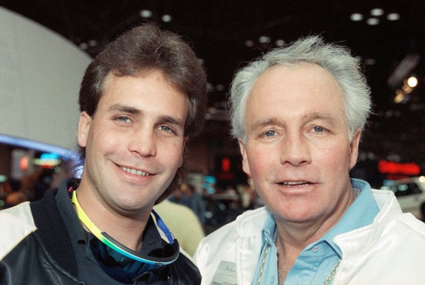 Motorcycle daredevil Robbie Knievel, left, and his famous father, Evel Kneivel, take part in a news conference in New York in 1989. (AP Photo/Marty Lederhandler, File)