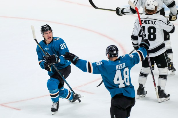 SAN JOSE, CALIFORNIA - January 17: San Jose Sharks' Timo Meier (28) is congratulated by San Jose Sharks' Tomas Hertl (48) for his hat trick against the Los Angeles Kings in the first period at the SAP Center in San Jose, Calif., on Monday, Jan. 17, 2022. (Shae Hammond/Bay Area News Group)