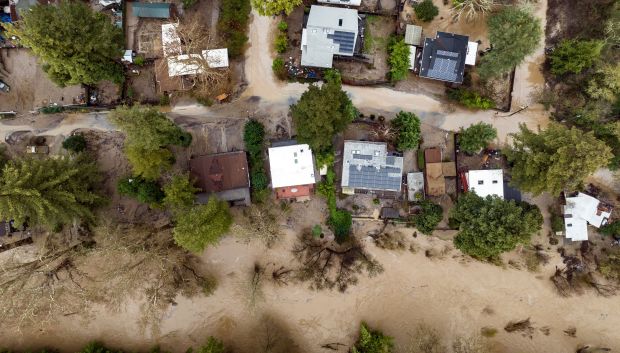 Floodwaters run through Felton, California on January 9, 2023. (Photo by Josh Edelson/AFP via Getty Images)
