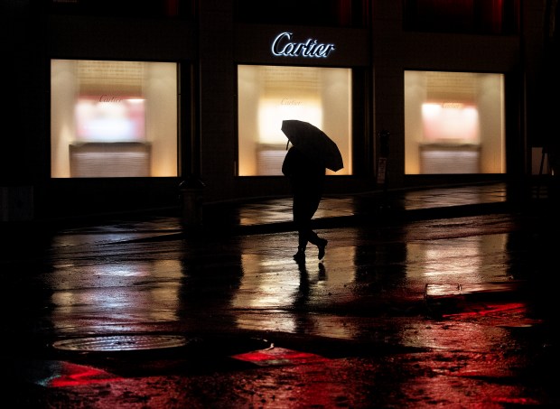 Lights reflect on the slick streets of San Francisco's Union Square district as a new set of storms takes aim at the Bay Area, Wednesday evening, Jan. 4, 2023. (Karl Mondon/Bay Area News Group)