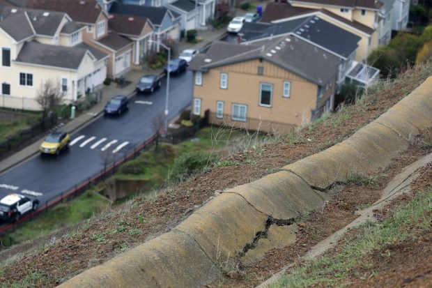 A damaged drainage culvert on a hillside above Seaview Drive on Wednesday, January 4, 2023, in Richmond, Calif. Residents along the street were voluntarily evacuated due to erosion on the hill. (Aric Crabb/Bay Area News Group)